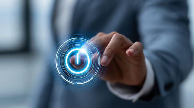 Businessman pressing an on button to activate a digital system, business decision making, digital optimization concept, faceless, defocused background, with copy space