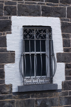 Ornate metal window grilles