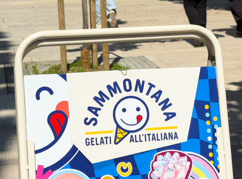 Venice, Italy - May 20, 2026: Colorful ice cream sign for Sammontana gelato featuring playful graphics and text in a vibrant outdoor setting