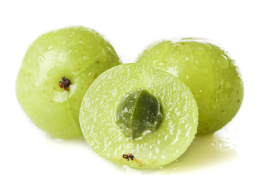 Fresh Green Gooseberries Still Life with Halved Fruit on White Background