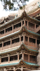 Fototapeta premium The old big sculptures view carved on the hill near Datong city in China for the buddhism reason 
