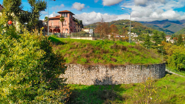Beautiful aerial view of Barga, nestled in the Garfagnana valley, bathed in sunlight