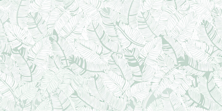 seamless repeating pattern of delicate mint green tropical fern leaves on a light background