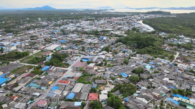 4K Drone Tracking Right Over Ranong City Landscape And Mangrove Forest
