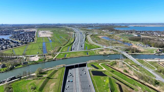 View of a road aqueduct above a busy highway in Europe