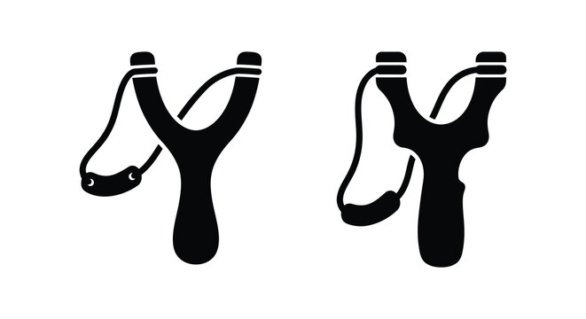Two black silhouettes of slingshots with elastic bands against a plain white background silhouette slingshot catapult