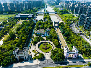 Aerial View of Urban Canal Park with High-Rise Buildings © LuuDieuThanh