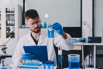 Fototapeta premium Lab technician experimenting in lab