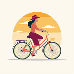 Fototapeta premium Woman Riding Bicycle at Sunset