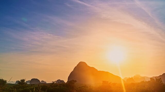 colorful sky at sunrise over Samet Nang Chee viewpoint.
Amazing light of nature cloudscape sky above Samed Nang Chee, Phang Nga.
High peaks wonderful morning sunrise natural Landscape.