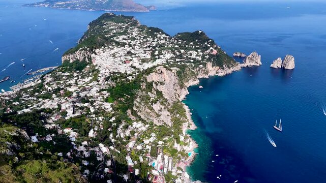 Aerial 4K drone video footage with panorama of Marina Piccola in Capri Island, scenic Mediterranean coastline in Italy. Spiaggia di Marina Piccola