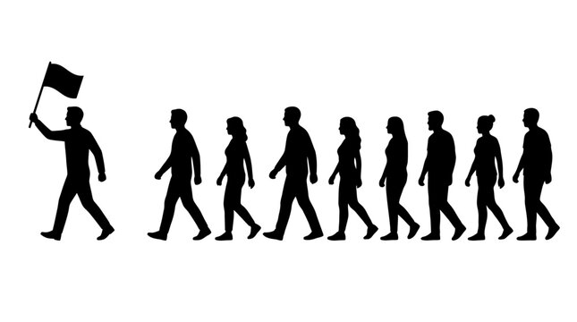 A silhouette of a group of people walking in a line led by a flag bearer.