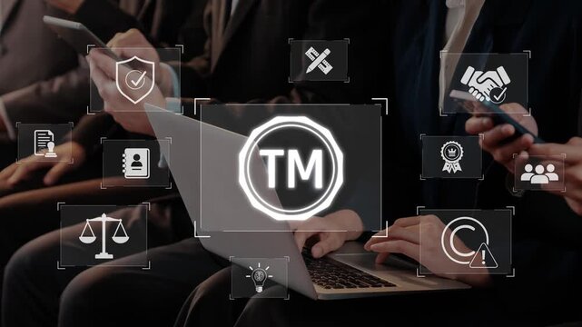 A group of business professionals using laptops and smartphones during a meeting, with icons showcasing trademark and legal themes representing modern corporate strategies. Raster