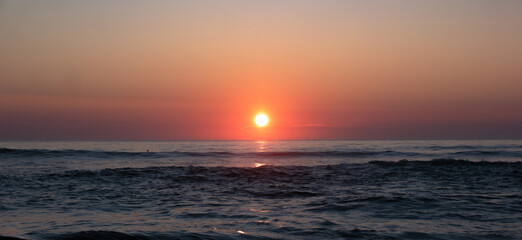 Burning Orange Sunset Over the Pacific Ocean © Jamie