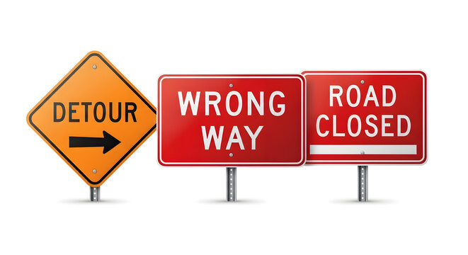 A detour road sign and wrong way road closed signs on a post