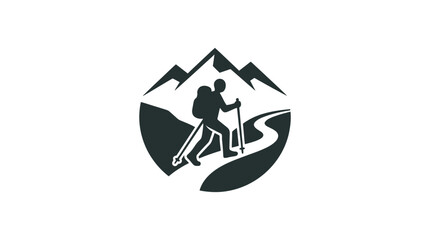 Hiker walks along a winding mountain trail with trekking poles to explore the rugged wilderness. © yanto