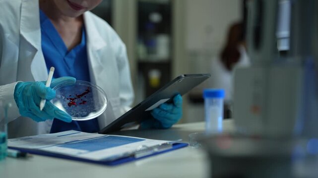 scientist in laboratory for medical study, research or experiment.
