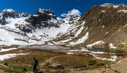 Naklejka premium Dal rifugio Migliorero, nel cuore delle Alpi Marittime lo sguardo è catturato dalle imponenti vette dell’Ischiator e del Corborant, che separano la provincia di Cuneo dalla regione francese dell’Ubaye