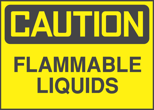 A caution sign warning of flammable liquids in a hazardous environment
