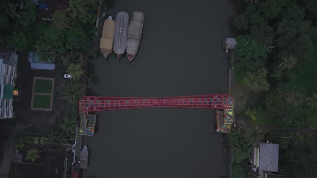 Aerial drone view of traditional houseboats on Kerala backwaters, Alappuzha, India.
