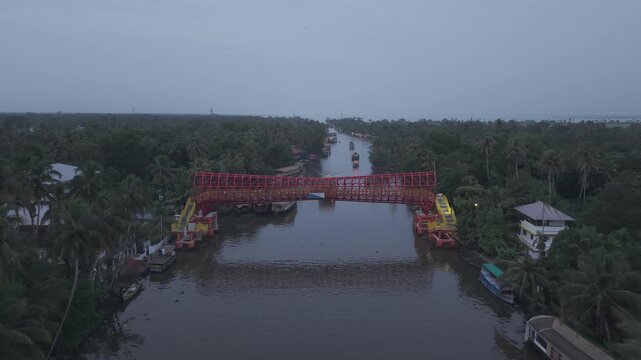 Aerial drone view of traditional houseboats on Kerala backwaters, Alappuzha, India.
