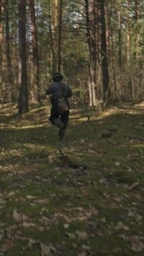 Group Of Soldiers With Carabines Mauser 98k Sneaking Through Forest. Wermacht