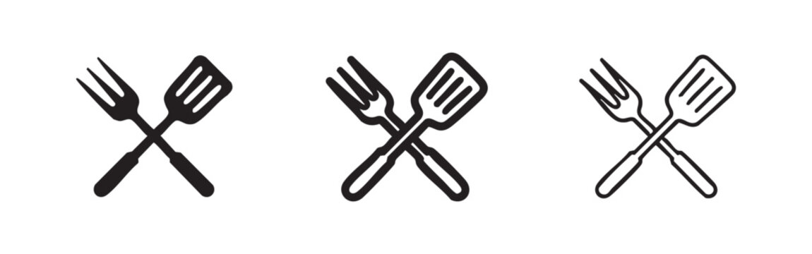 Crossed spatula and fork icon