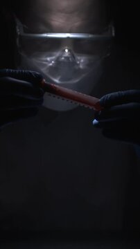 Laboratory Inspection Scene. Researcher Carefully Handling Tools During Forensic Investigation Process
