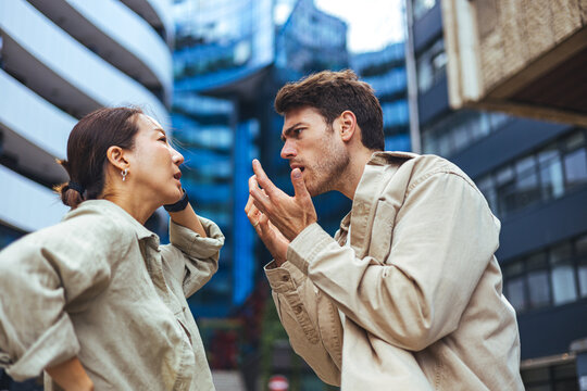 Young Couple Argument In Urban Setting Showing Relationship Conflict And Emotional Disagreement