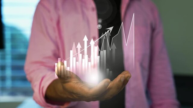 Business man holding virtual screen growing business graph chart on screen, Hand holding virtual financial growth chart