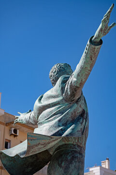 staue of the famous apulian singer Domenico Modugno in Polignano a Mare in Apulia