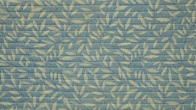 Light green leaf patterned fabric, nature style.