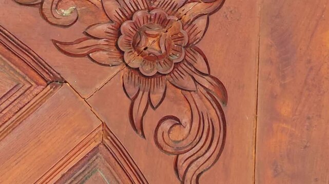 Wood carvings with traditional Thai patterns.