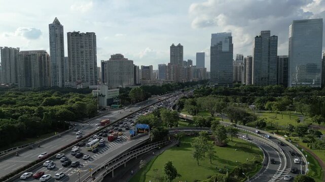 Aerial view of Guangzhou Bridge cloverleaf interchange ramp and urban traffic flow in daytime, Guangdong, China