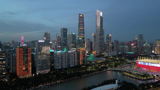 Aerial view of Guangzhou Zhujiang New Town CBD skyline and illuminated skyscrapers at night, Guangdong, China