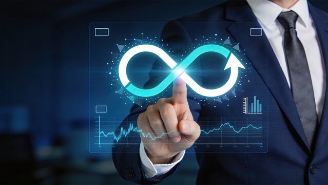 Businessman touching glowing infinity loop symbol on virtual screen with financial charts graphs representing endless growth continuous improvement sustainable development