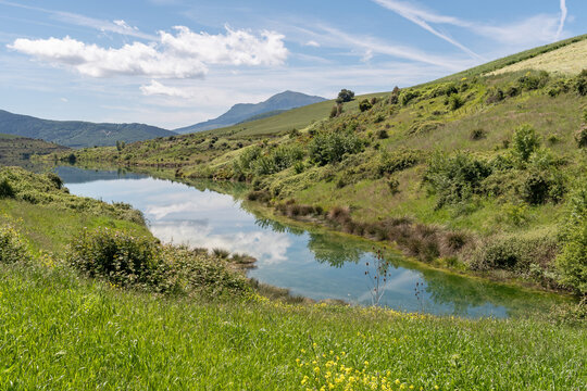 Small reservoir between scrubland and cultivated fields. Villaveta, Navarra