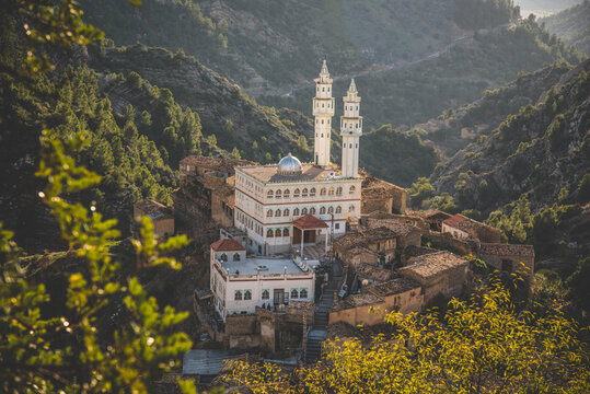 Mosque Inside a Forest in Algeria Scenic mountain forest village with a traditional Algerian mosque and stone architecture
