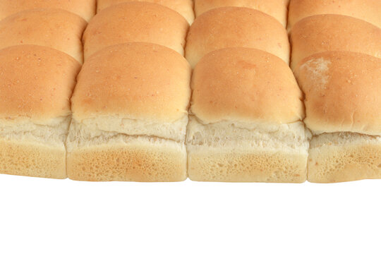isolated row of mini bread roll buns