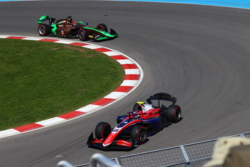 Obraz premium May 22, 2026, Montreal, Canada, F1 Academy car races through Circuit Gilles Villeneuve during Grand Prix weekend. g.