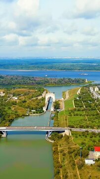 Vertical video. Volgograd, Russia. Krasnoarmeisky district. Volga-Don Canal. Drone footage, Departure of the camera. Rich colors