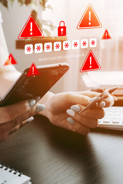 User receiving scam message while holding phone and card during online banking session