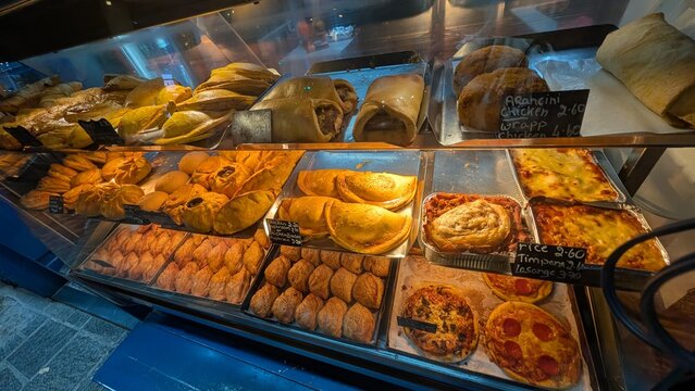 Maltese pastries and baked side dishes in the showcase in Malta island