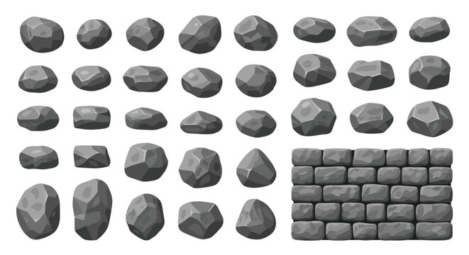 Large set of gray stones in various shapes and sizes alongside a section of a finished interlocking stone brick garden wall.