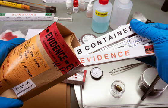 Police scientist takes evidence swab bag boxes to analyse for traces of dna from homicide in crime lab, concept image