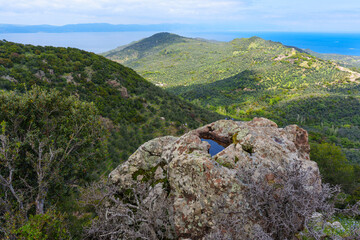 Fototapeta premium Panoramic View of Lush Green Hills and the Aegean Sea in Lesbos Greece