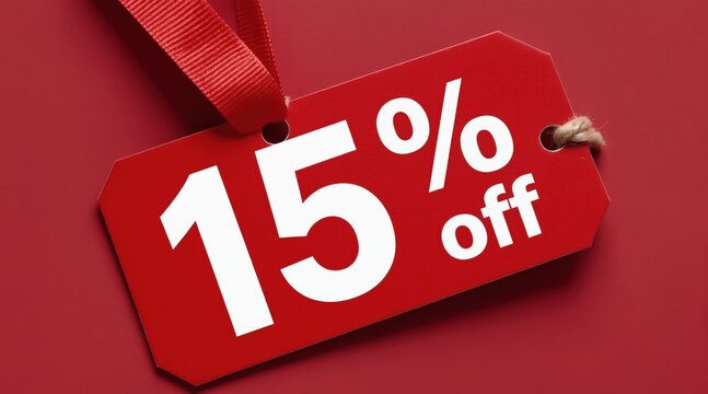 Red sale tag shows fifteen percent off text for retail promo. Shopping discount offer sign for customers and shoppers. Special price reduction marketing concept.