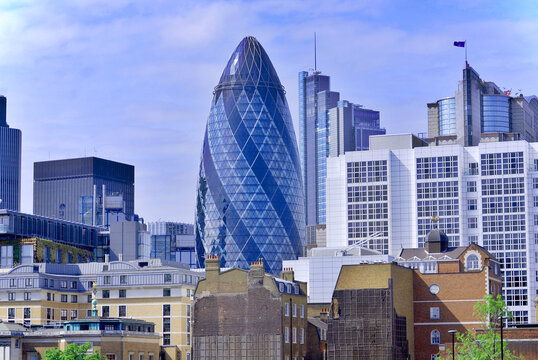 LONDON  ENGLAND UNITED KINGDOM: The modern 30 St Mary Axe in London, UK. The building, called Swiss Re Building or informally the Gherkin, was damaged in 1992 by a bomb placed by the Provisional IRA.
