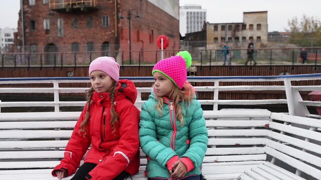 Two sisters go on tourist boat on Vistula River