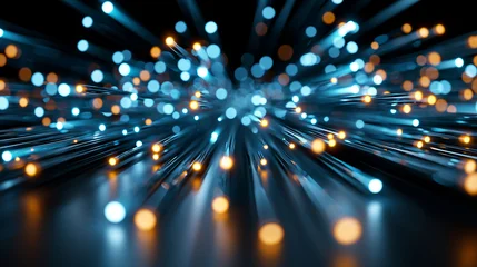 Abstrakte Nahaufnahme von leuchtenden Glasfaserkabeln mit blauen und goldenen Lichtpunkten auf dunklem Hintergrund. © Nick Freund
